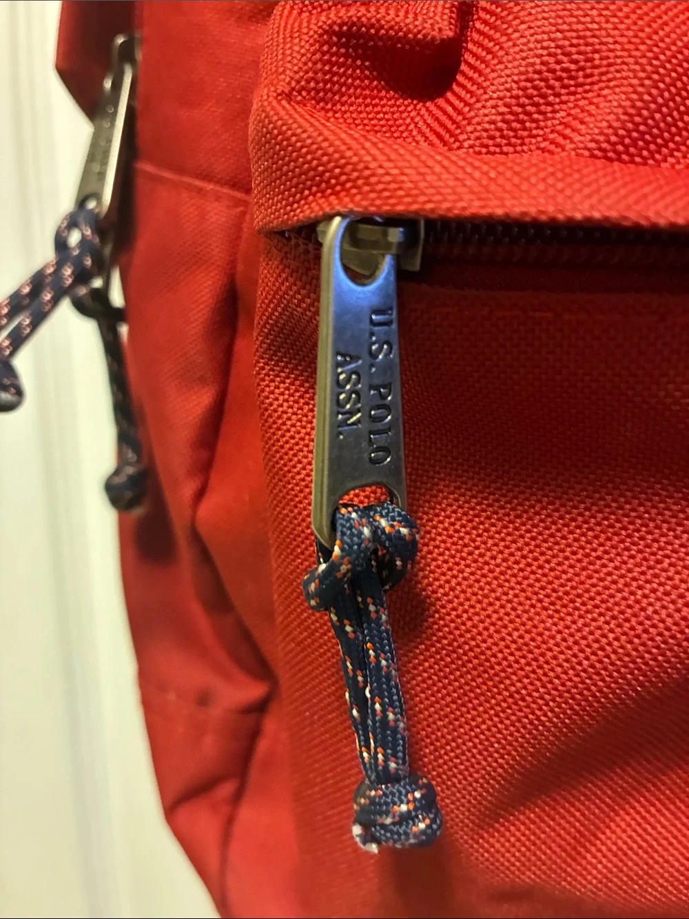 U.S. Polo Assn.Red Unisex 18”solid core backpack w/large main zipped compartment
